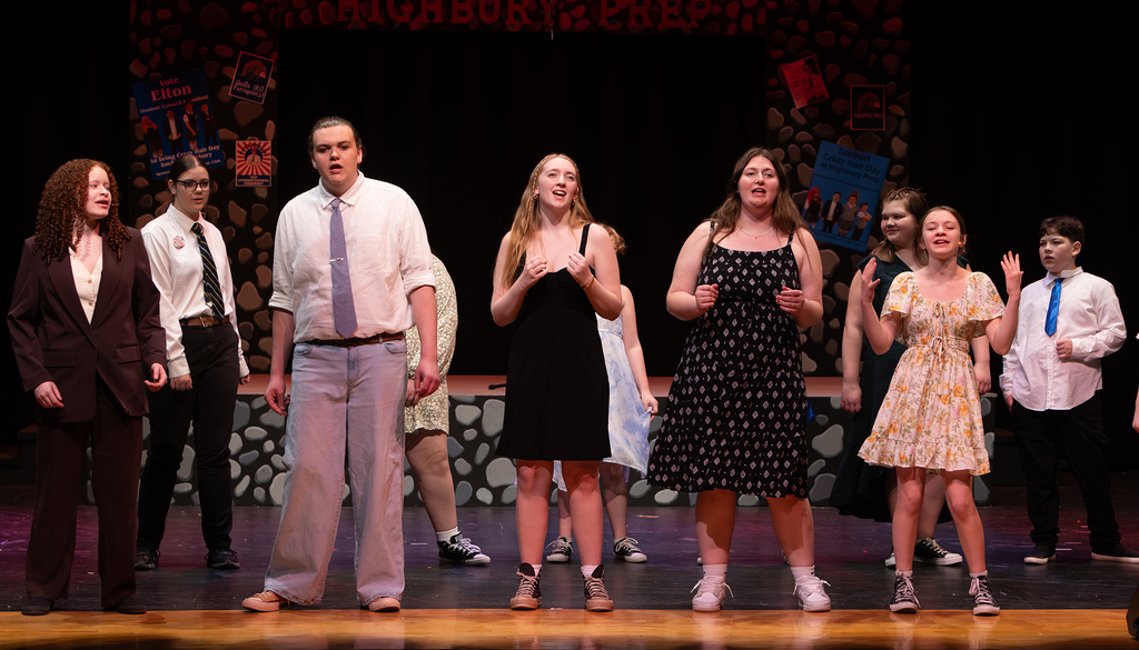 Cast performing Emma on stage