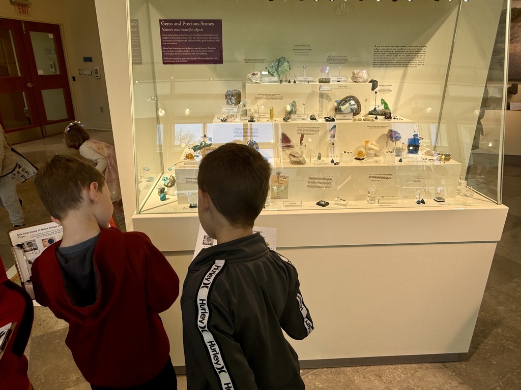 Otselic Valley first grade students explore exhibits, participate in hands-on activities, and learn during a field trip to the Colgate Science Center, planetarium, and geology museum.