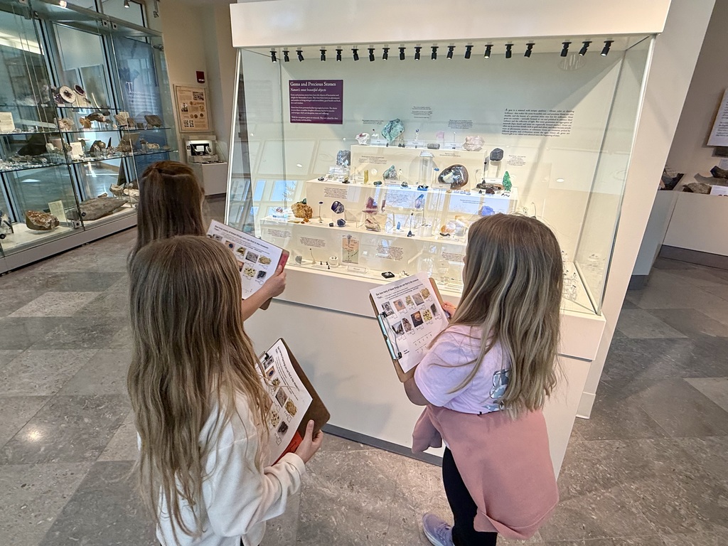 Otselic Valley first grade students explore exhibits, participate in hands-on activities, and learn during a field trip to the Colgate Science Center, planetarium, and geology museum.