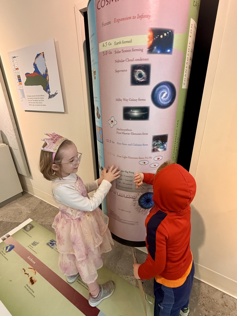 Otselic Valley first grade students explore exhibits, participate in hands-on activities, and learn during a field trip to the Colgate Science Center, planetarium, and geology museum.