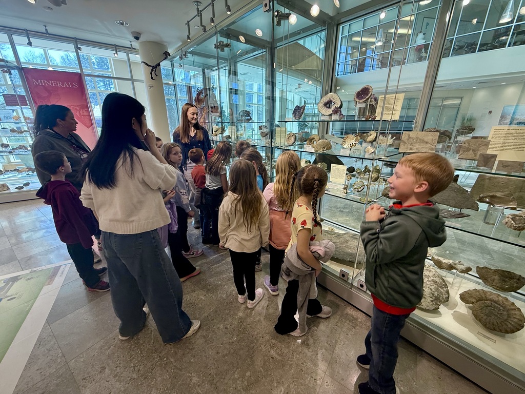 Otselic Valley first grade students explore exhibits, participate in hands-on activities, and learn during a field trip to the Colgate Science Center, planetarium, and geology museum.
