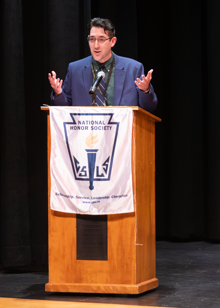 OV Superintendent talks during the NHS and Jr. NHS ceremony