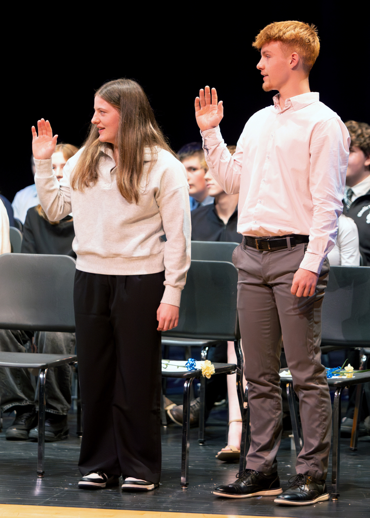 Two students take the NHS pledge
