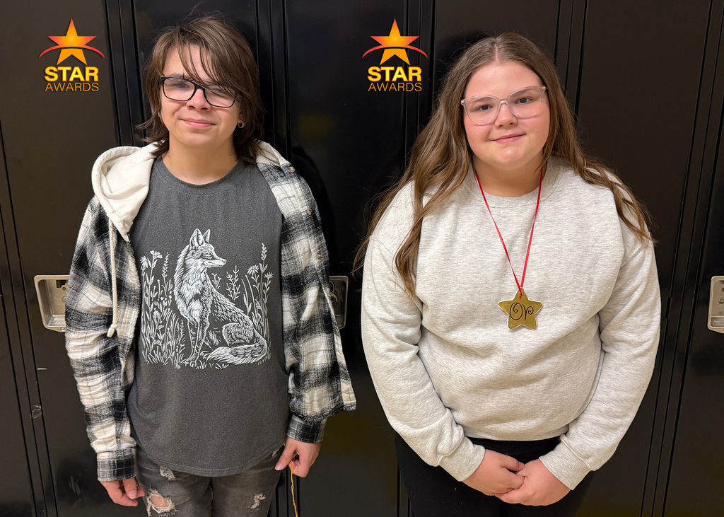 Students pose for a photo after being recognized as Otselic Valley Star Award recipients for demonstrating cooperation.
