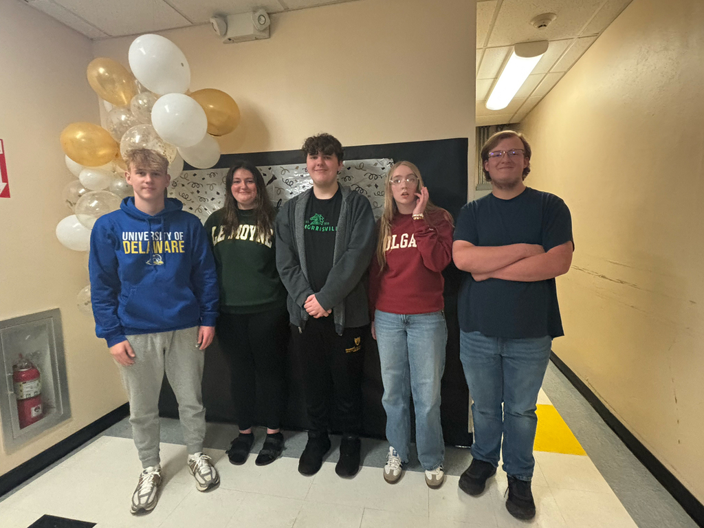 OV seniors gather for a Decision Day celebration, posing for group photos with classmates.