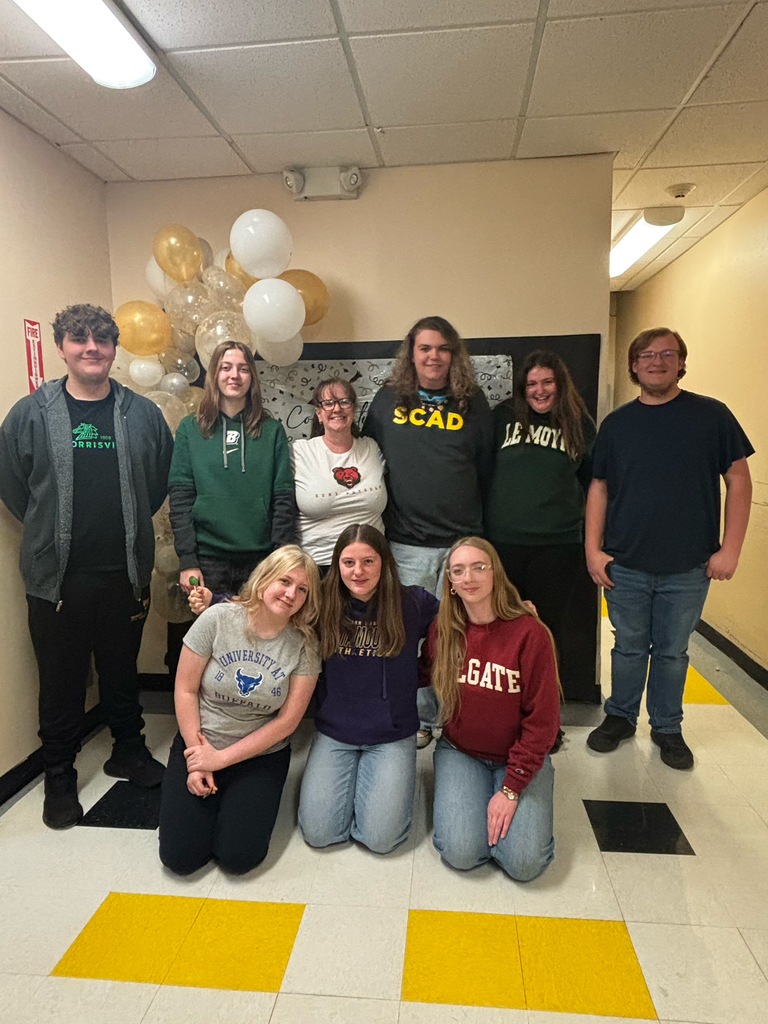 OV seniors gather for a Decision Day celebration, posing for group photos with classmates.