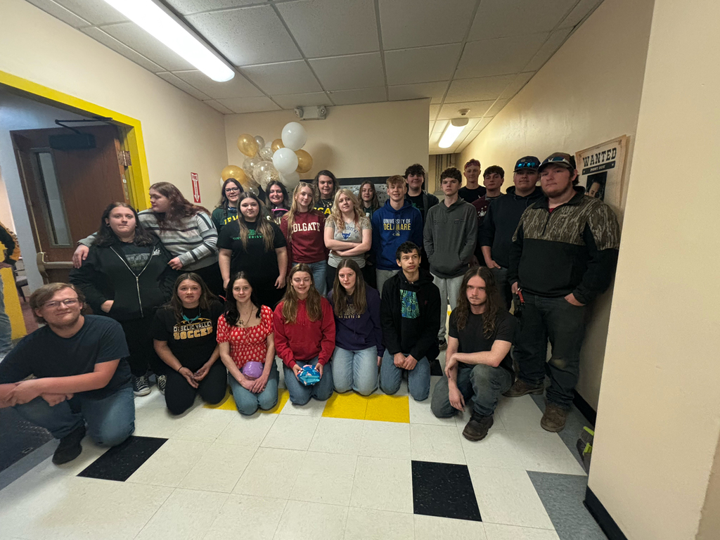 OV seniors gather for a Decision Day celebration, posing for group photos with classmates.