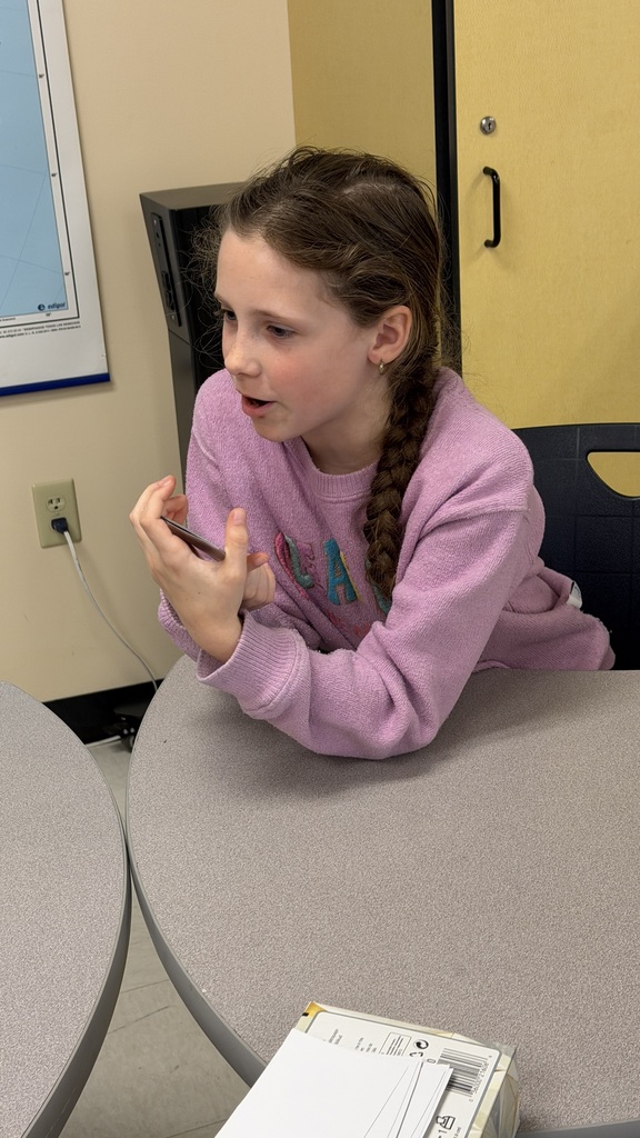 Third grade students participate in interactive Spanish language activities, including games and hands-on learning focused on body parts vocabulary.