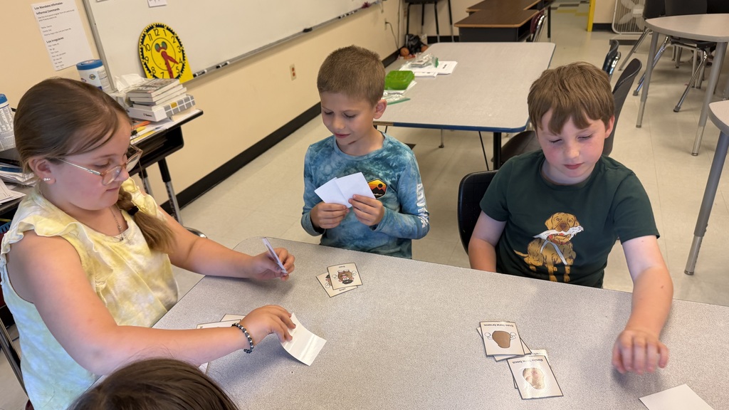 Third grade students participate in interactive Spanish language activities, including games and hands-on learning focused on body parts vocabulary.
