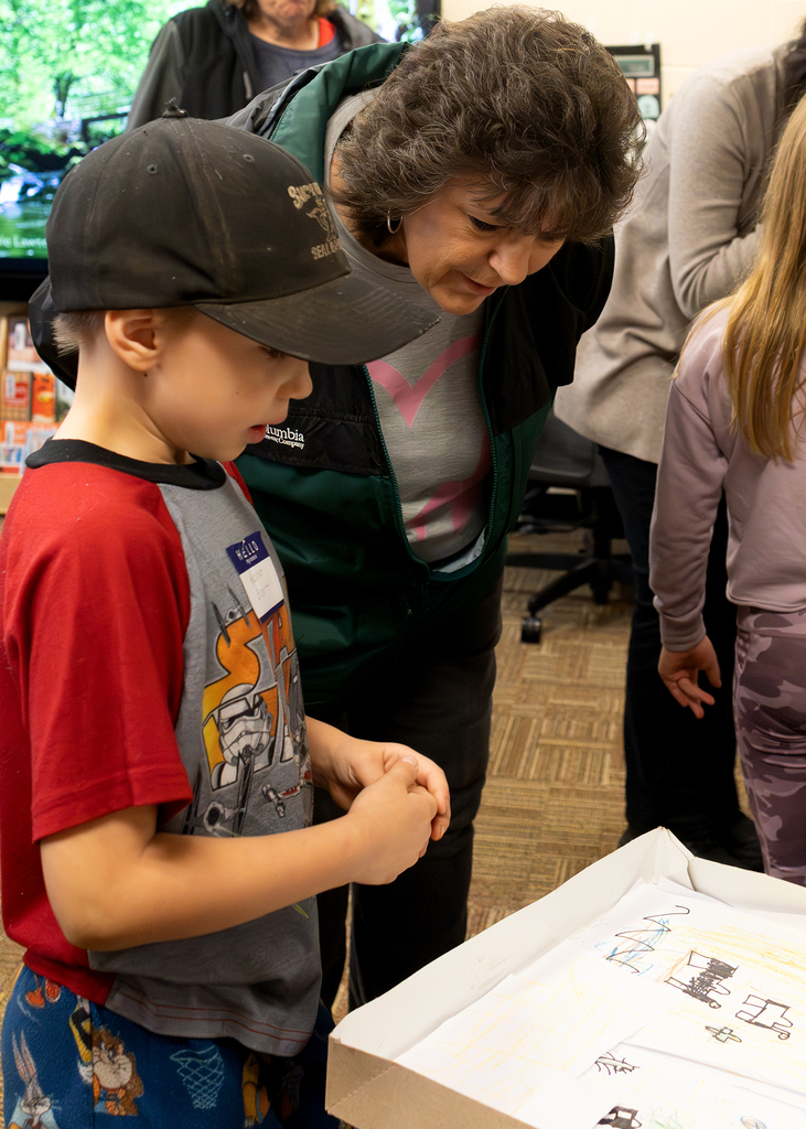 Families visit 2nd graders for Animal Habitat showcase