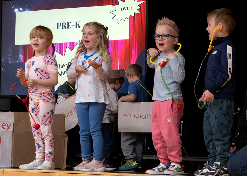 PreK students perform Five Little Monkeys