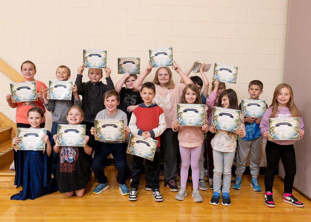 Third grade students with their certificates