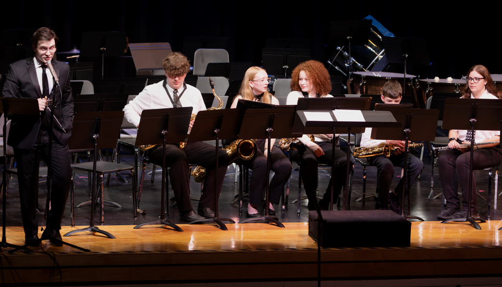Photos from the Otselic Valley Spring Band and Chorus Concert featuring student musicians and vocalists performing on stage.