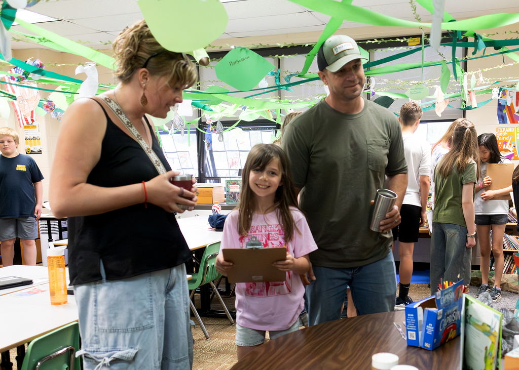 Photos from the “Welcome to the Jungle” rainforest classroom tour featuring student-created displays, artwork, and interactive learning experiences.