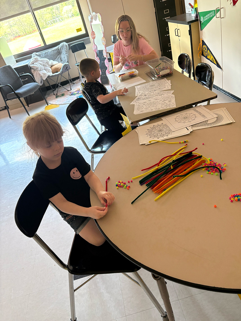 Students participate in interactive activities during the Coping Skills Fair at Otselic Valley, exploring coping strategies such as mindfulness, breathing exercises, sensory tools, movement, and fidgets.