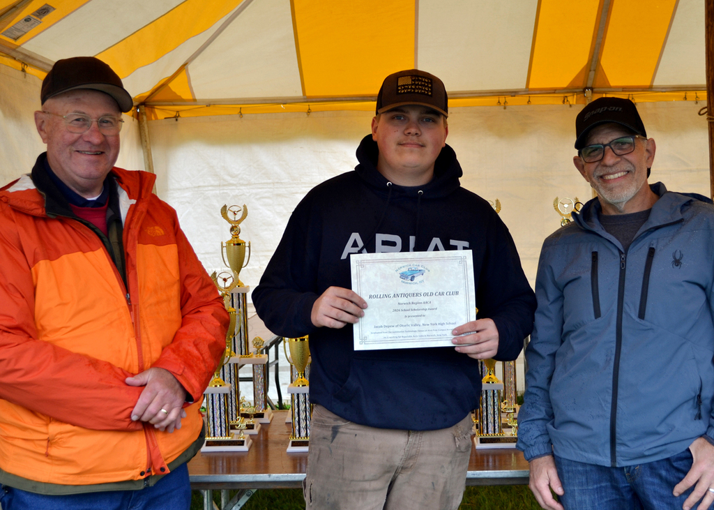 OV student Jacob Depew receives a scholarship from the Norwich Car Club