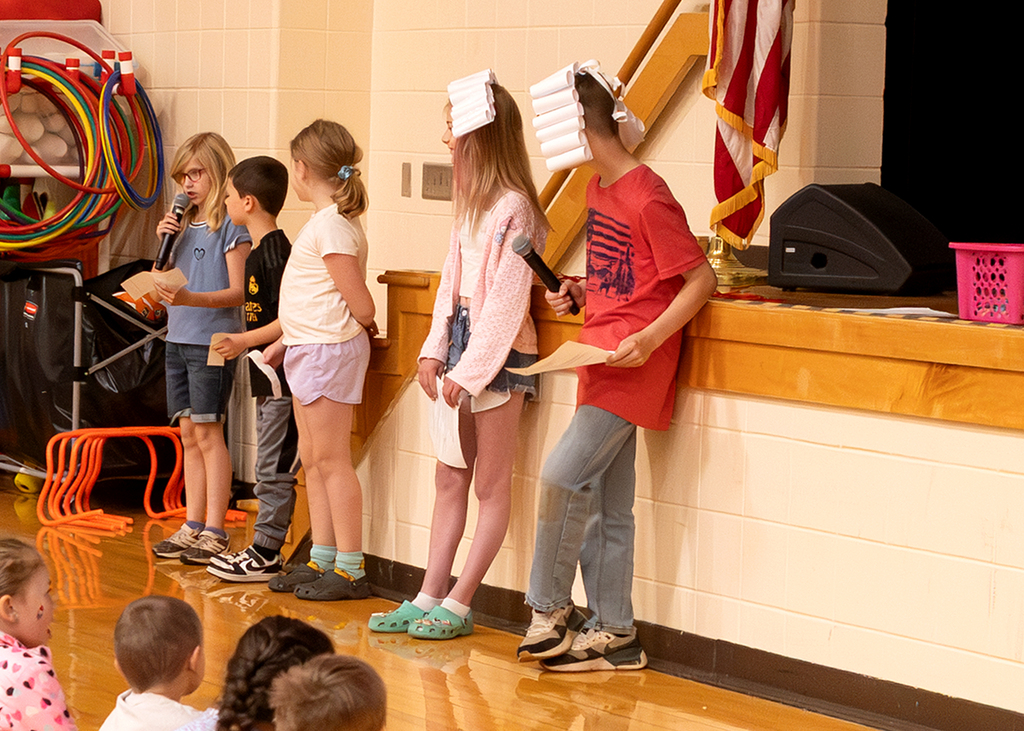 Students participate in the Otselic Valley Morning Program, including grade-level presentations, OV Stars recognition, birthday celebrations, musical performances, and OV’s Got Talent acts in the school auditorium.