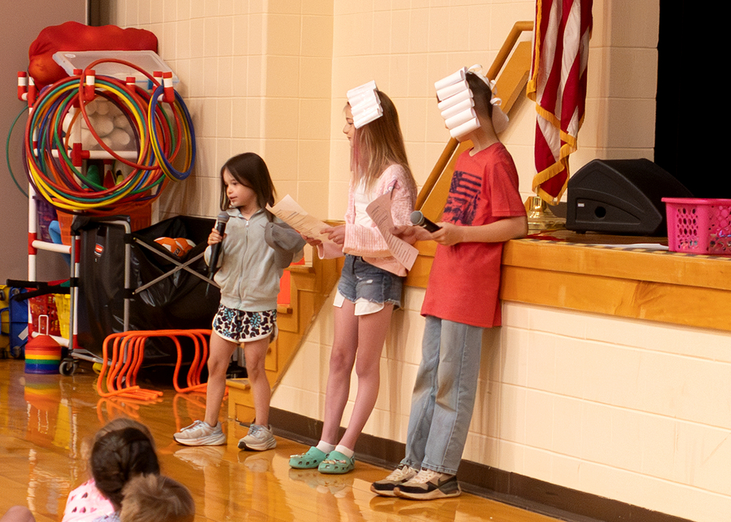 Students participate in the Otselic Valley Morning Program, including grade-level presentations, OV Stars recognition, birthday celebrations, musical performances, and OV’s Got Talent acts in the school auditorium.