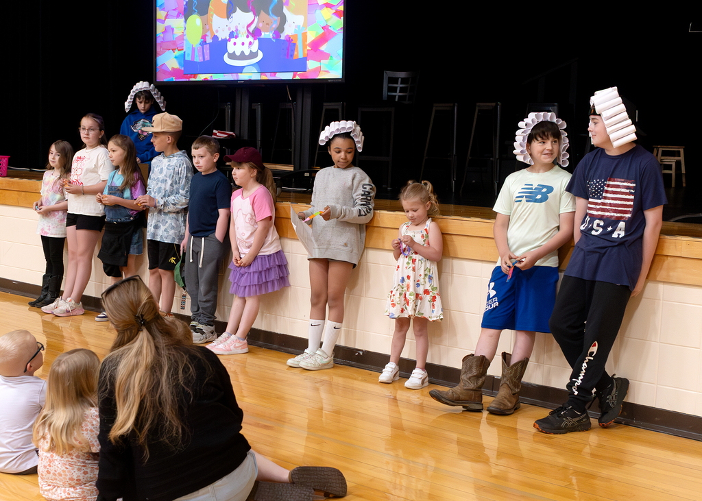 Students participate in the Otselic Valley Morning Program, including grade-level presentations, OV Stars recognition, birthday celebrations, musical performances, and OV’s Got Talent acts in the school auditorium.
