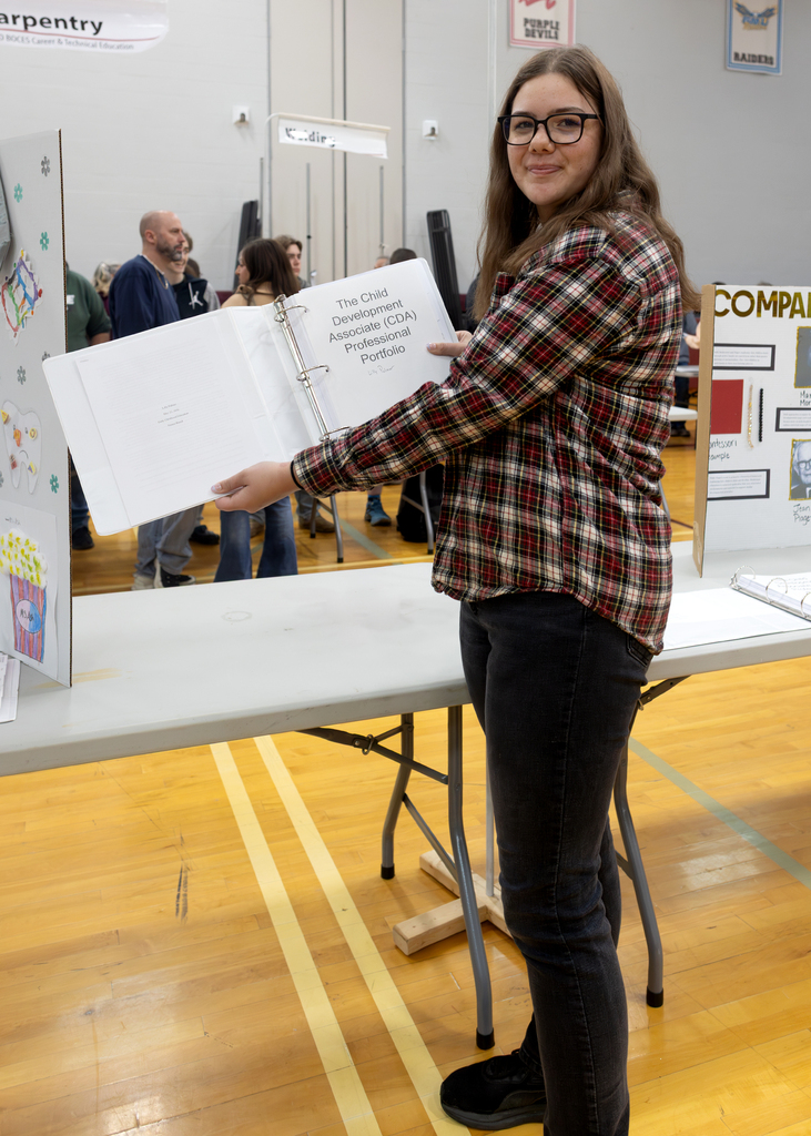 Photos from the DCMO BOCES Senior Showcase featuring Otselic Valley seniors presenting Career and Technical Education projects
