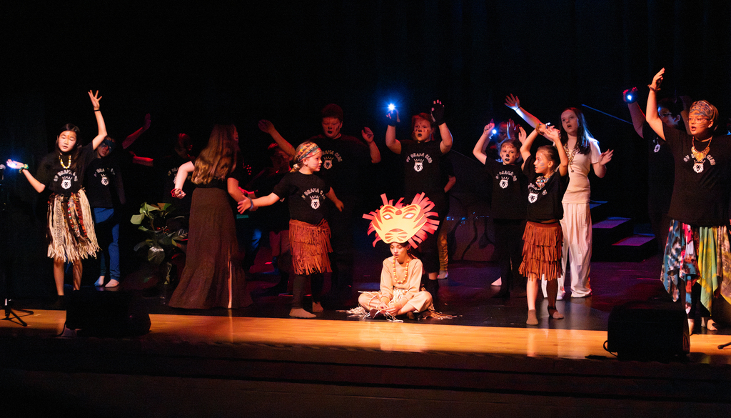 Students perform scenes from Disney's The Lion King KIDS during a dress rehearsal at Otselic Valley. The photos show cast members in costume and on stage as they bring the story of Simba and the Pride Lands to life.