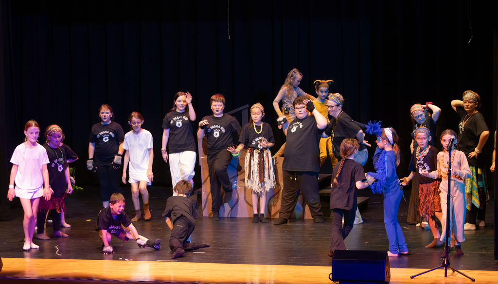 Students perform scenes from Disney's The Lion King KIDS during a dress rehearsal at Otselic Valley. The photos show cast members in costume and on stage as they bring the story of Simba and the Pride Lands to life.