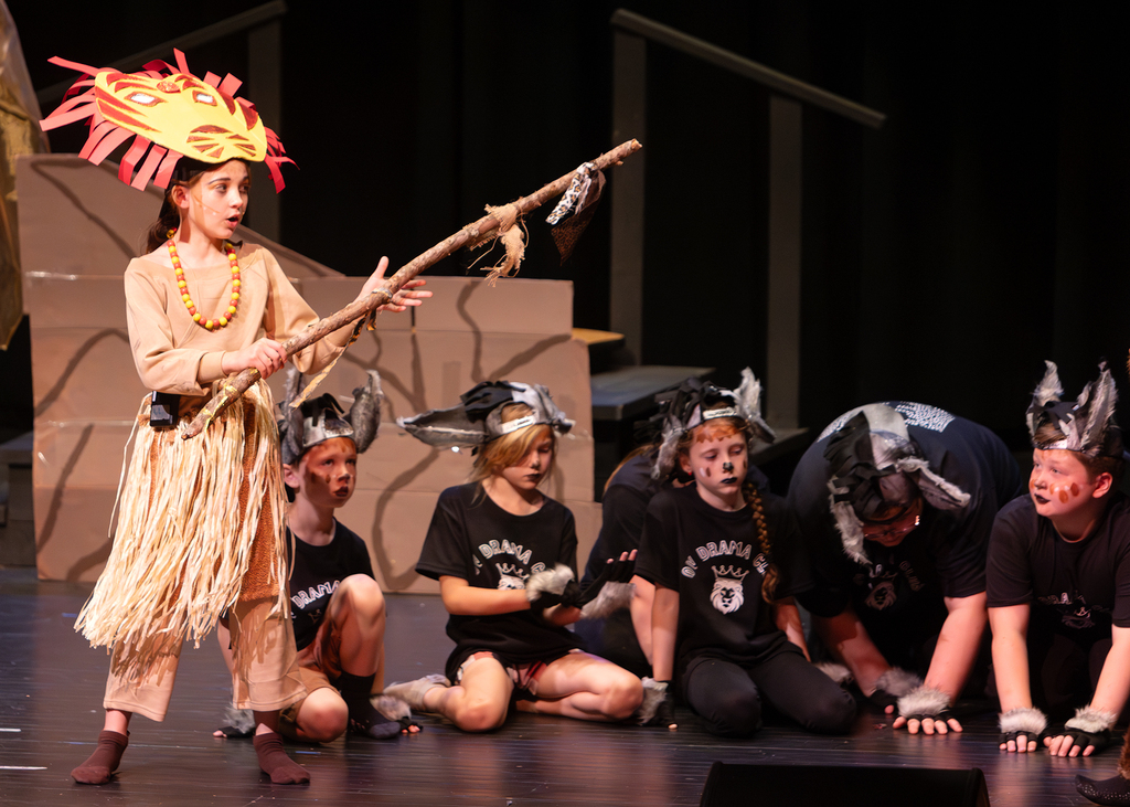 Students perform scenes from Disney's The Lion King KIDS during a dress rehearsal at Otselic Valley. The photos show cast members in costume and on stage as they bring the story of Simba and the Pride Lands to life.