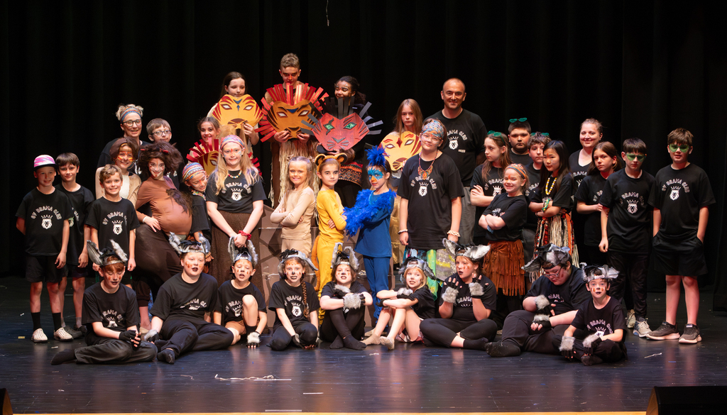 Students perform scenes from Disney's The Lion King KIDS during a dress rehearsal at Otselic Valley. The photos show cast members in costume and on stage as they bring the story of Simba and the Pride Lands to life.