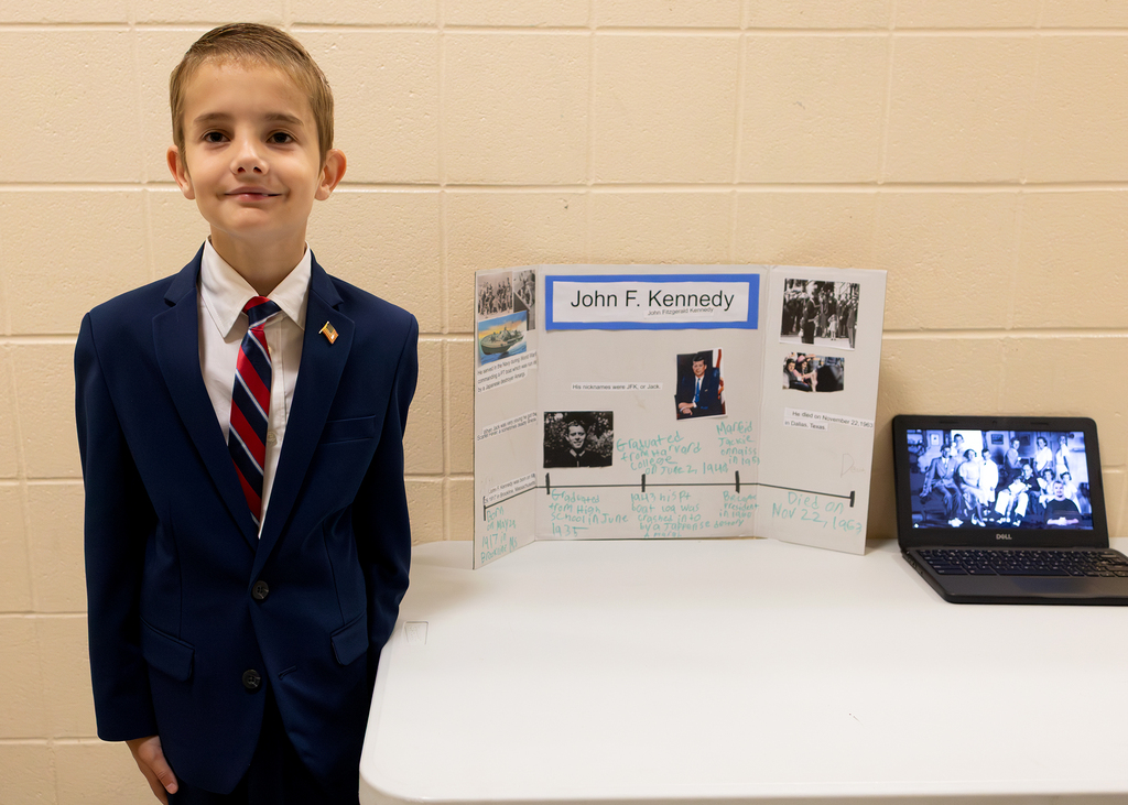 Fourth and fifth grade students participate in a Wax Museum project at Otselic Valley. Students dress as historical figures and notable individuals while presenting information and answering questions from visitors who toured the exhibits.