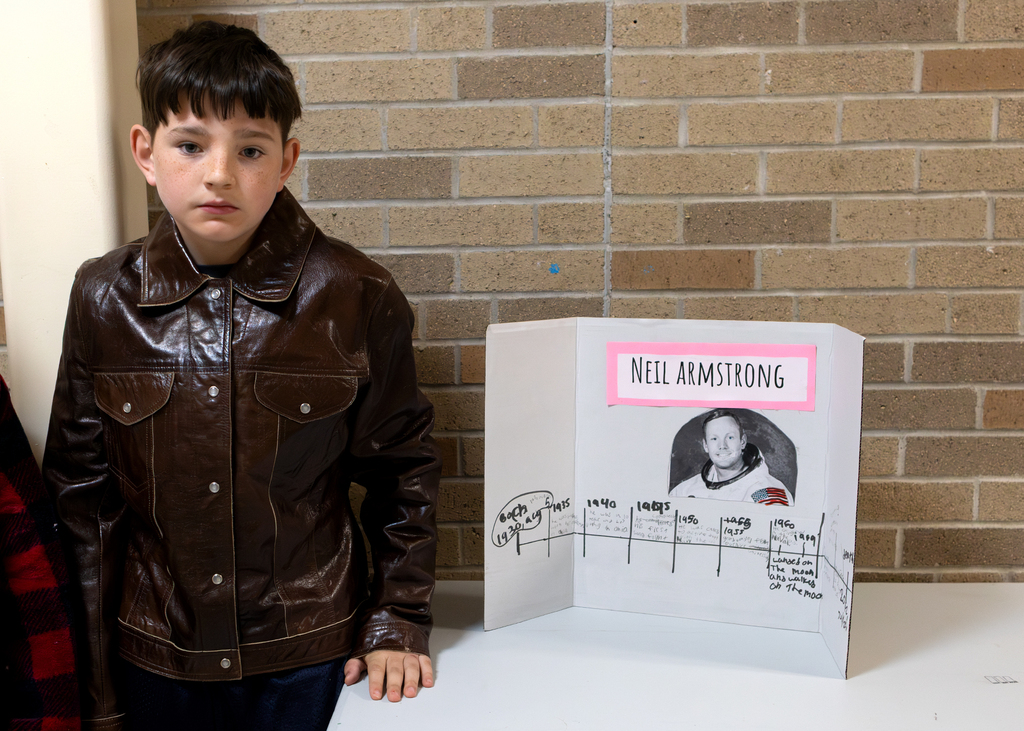 Fourth and fifth grade students participate in a Wax Museum project at Otselic Valley. Students dress as historical figures and notable individuals while presenting information and answering questions from visitors who toured the exhibits.