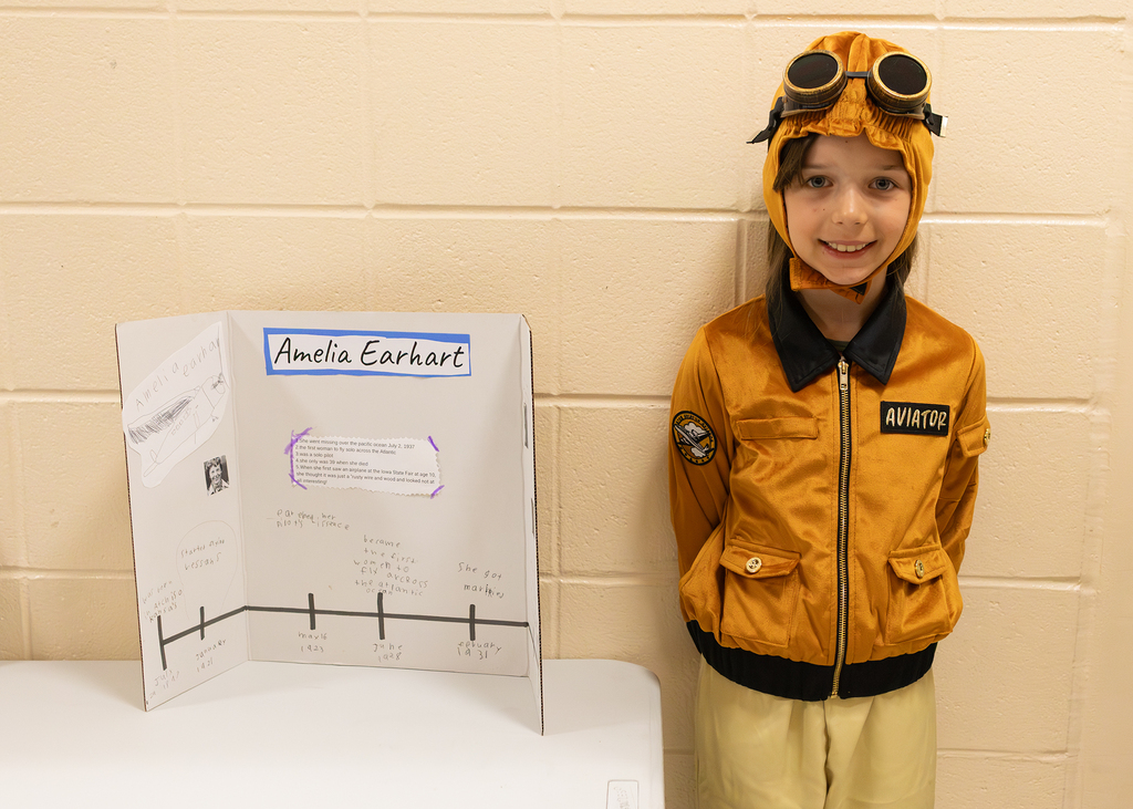 Fourth and fifth grade students participate in a Wax Museum project at Otselic Valley. Students dress as historical figures and notable individuals while presenting information and answering questions from visitors who toured the exhibits.