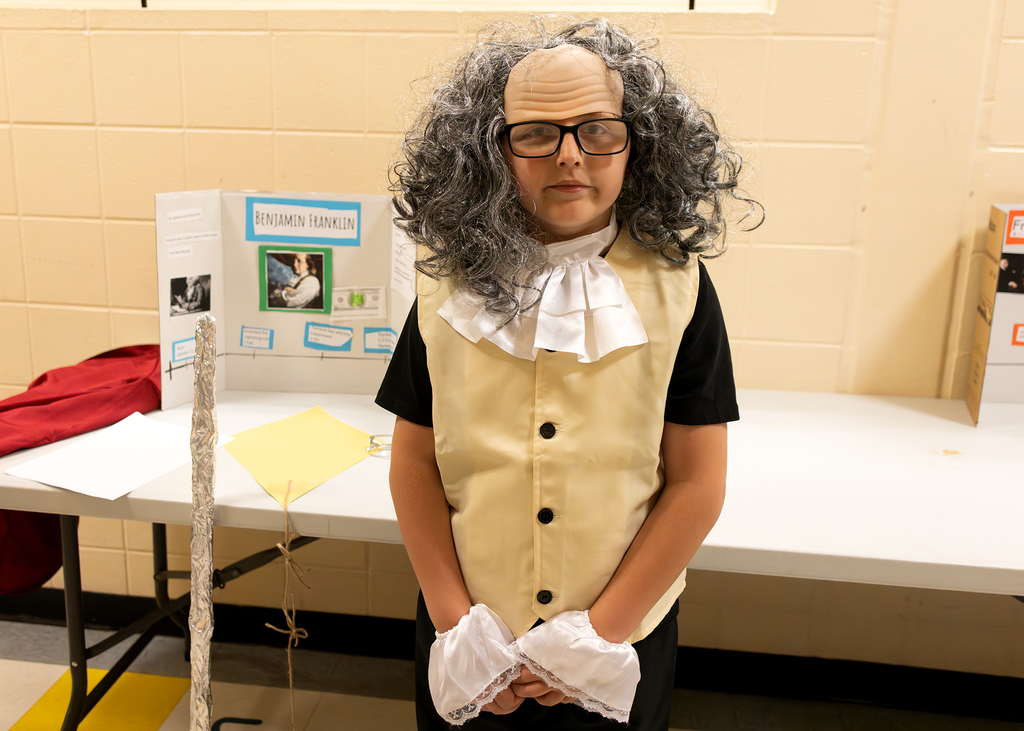 Fourth and fifth grade students participate in a Wax Museum project at Otselic Valley. Students dress as historical figures and notable individuals while presenting information and answering questions from visitors who toured the exhibits.