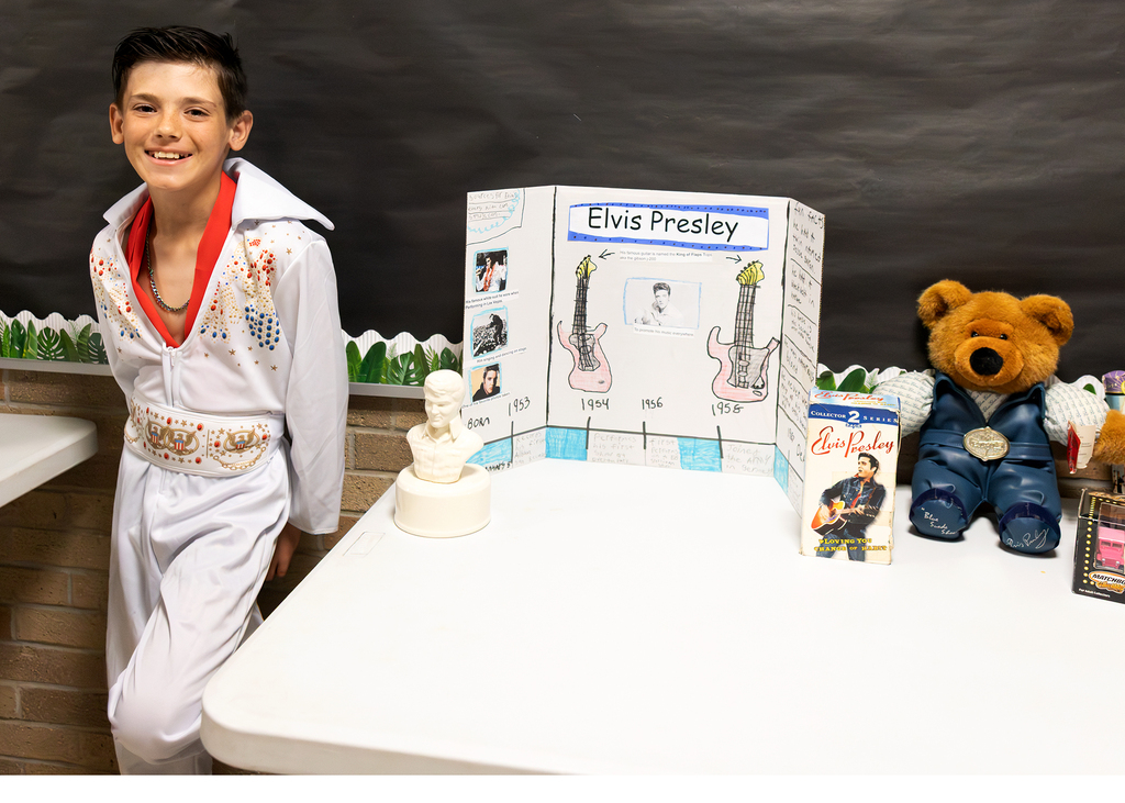 Fourth and fifth grade students participate in a Wax Museum project at Otselic Valley. Students dress as historical figures and notable individuals while presenting information and answering questions from visitors who toured the exhibits.