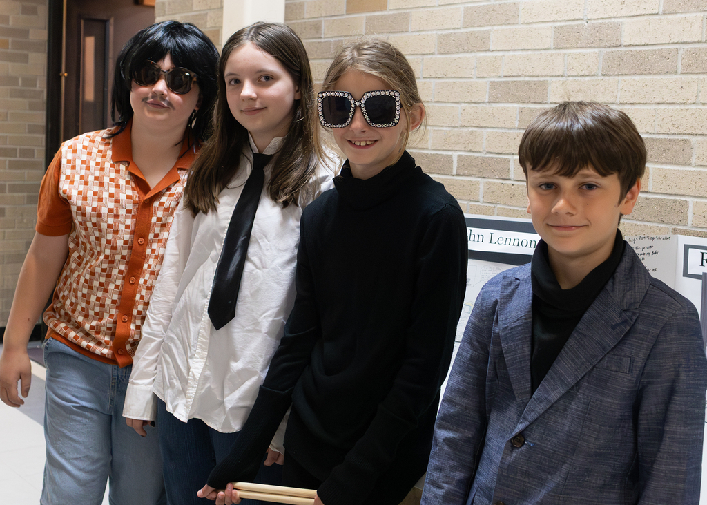 Fourth and fifth grade students participate in a Wax Museum project at Otselic Valley. Students dress as historical figures and notable individuals while presenting information and answering questions from visitors who toured the exhibits.