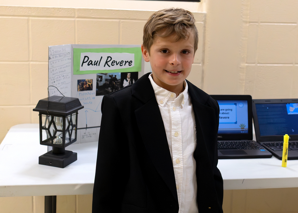 Fourth and fifth grade students participate in a Wax Museum project at Otselic Valley. Students dress as historical figures and notable individuals while presenting information and answering questions from visitors who toured the exhibits.