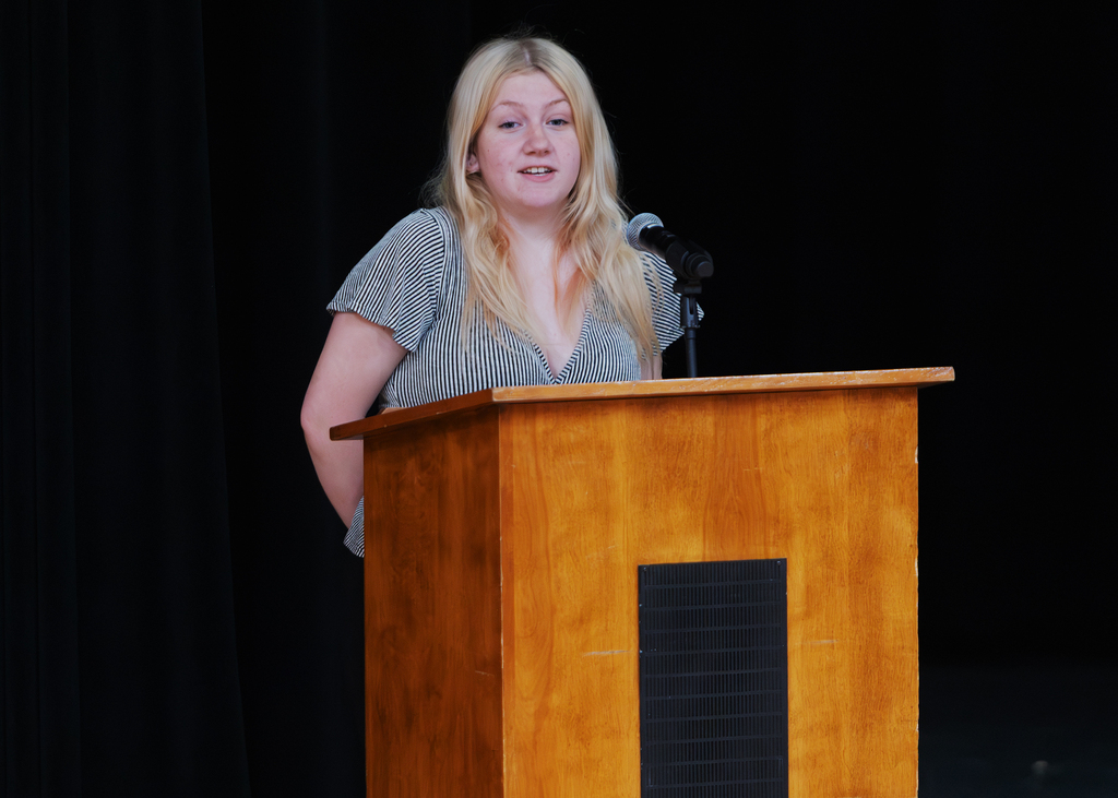 Otselic Valley seniors present their Civic Action Projects during the Voices for Change event. Students speak to an audience while sharing research, community concerns, and action plans developed throughout the school year.