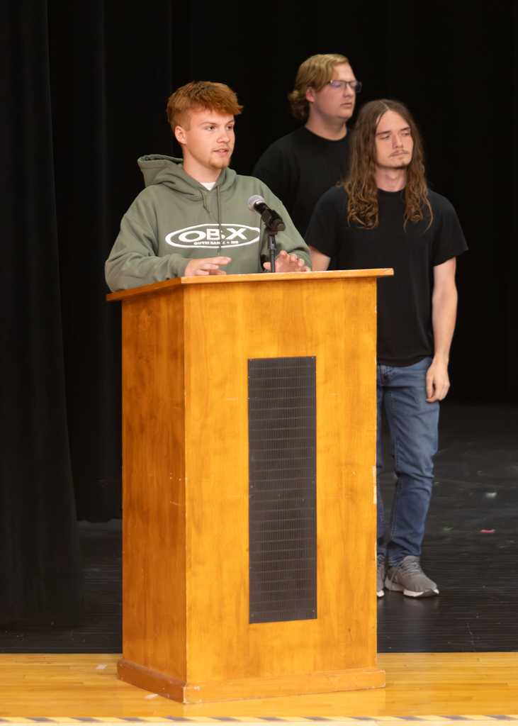 Otselic Valley seniors present their Civic Action Projects during the Voices for Change event. Students speak to an audience while sharing research, community concerns, and action plans developed throughout the school year.