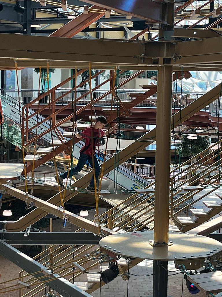 Students explore interactive exhibits and attractions at WonderWorks.