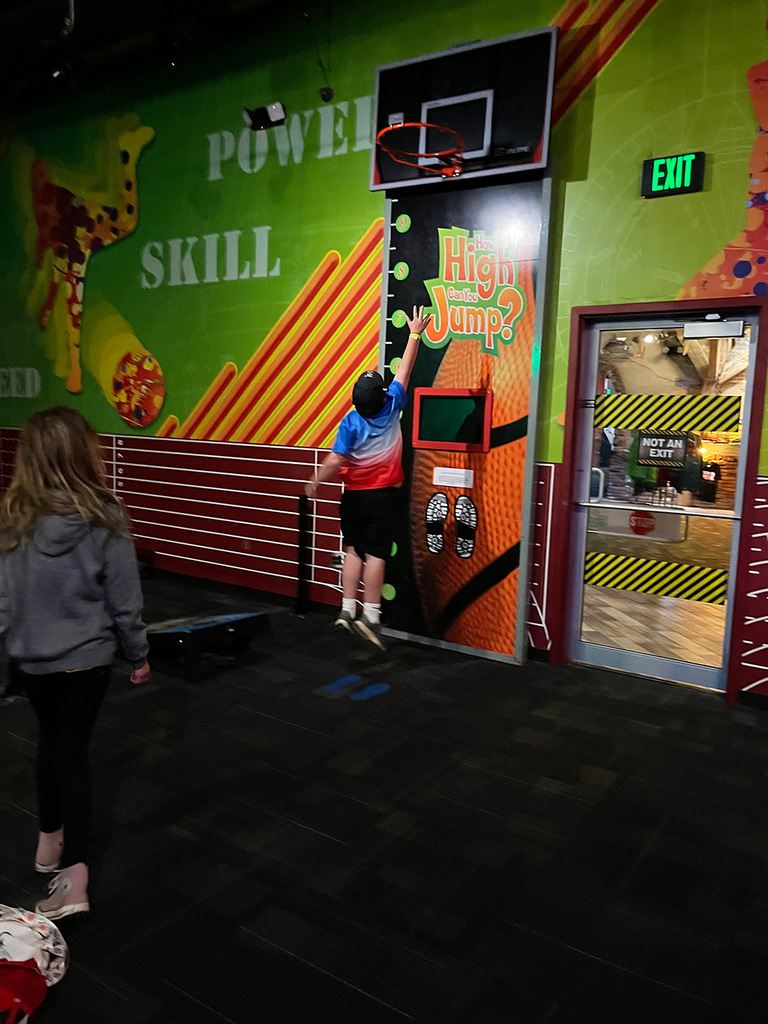 Students explore interactive exhibits and attractions at WonderWorks.