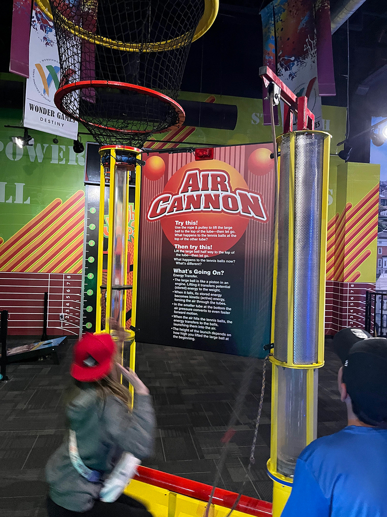 Students explore interactive exhibits and attractions at WonderWorks.