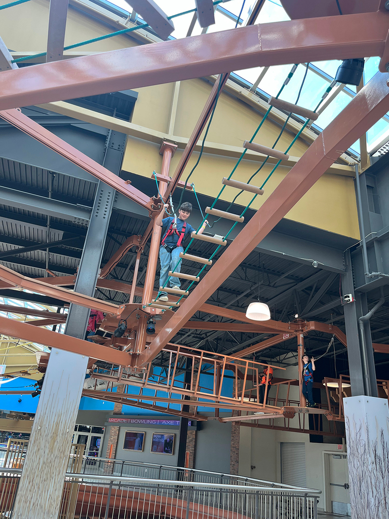 Students explore interactive exhibits and attractions at WonderWorks.