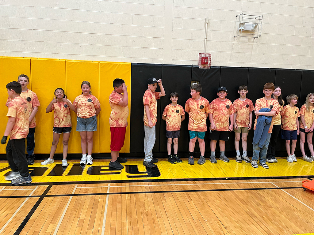 Elementary students enjoy Field Day activities and games with classmates.