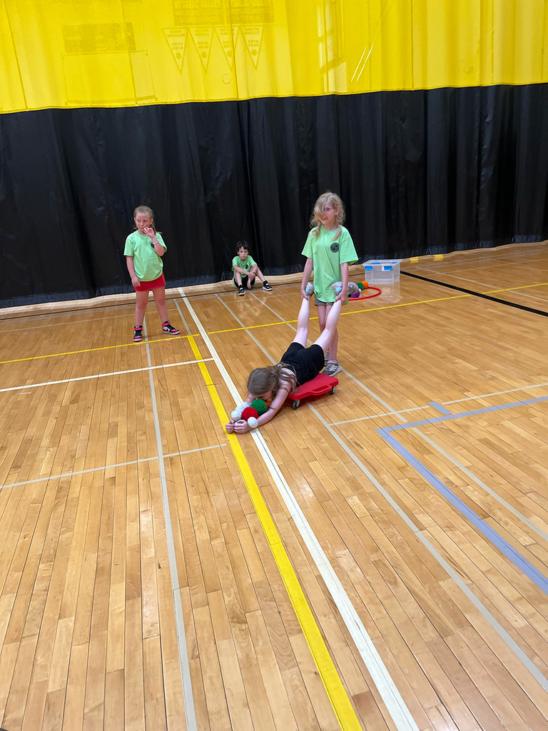 Elementary students enjoy Field Day activities and games with classmates.