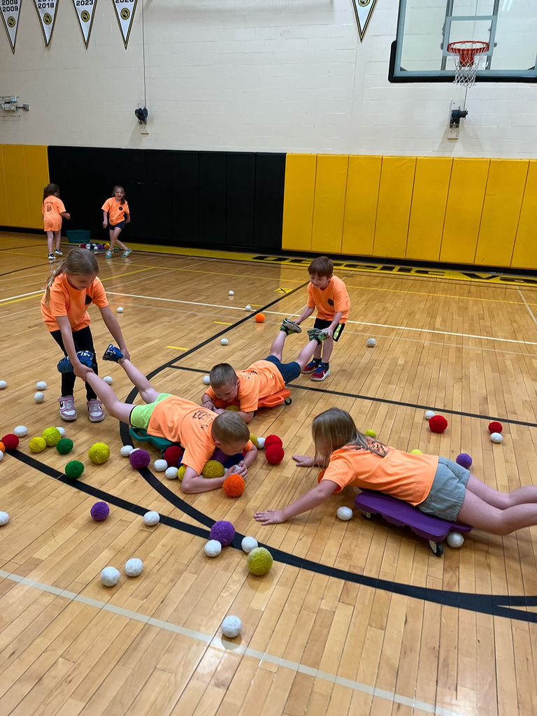 Elementary students enjoy Field Day activities and games with classmates.