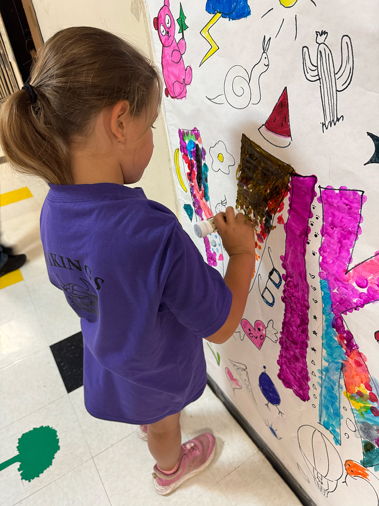 Elementary students enjoy Field Day activities and games with classmates.