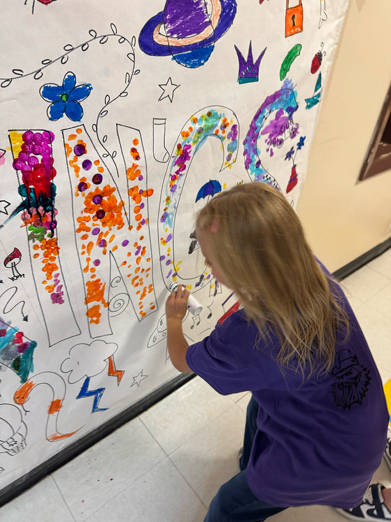 Elementary students enjoy Field Day activities and games with classmates.