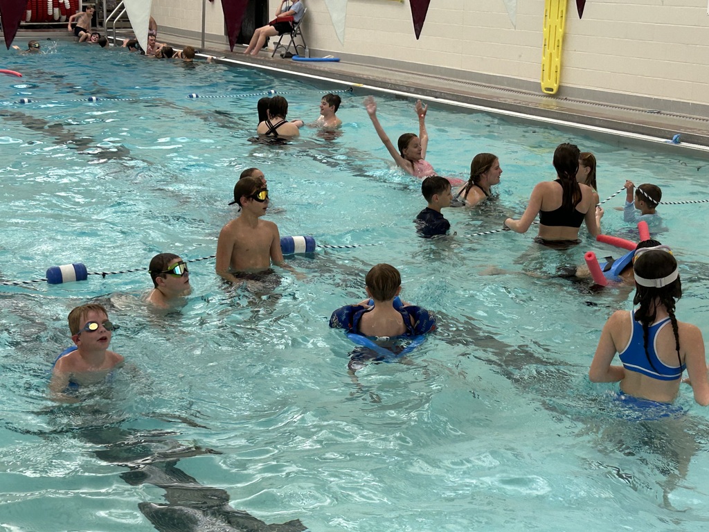 Students swim in the Sherbune Earlville pool.