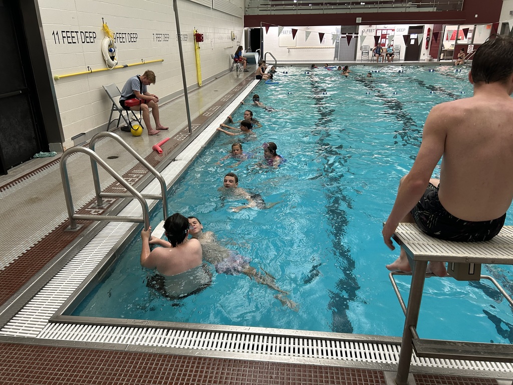 Students swim in the Sherbune Earlville pool.