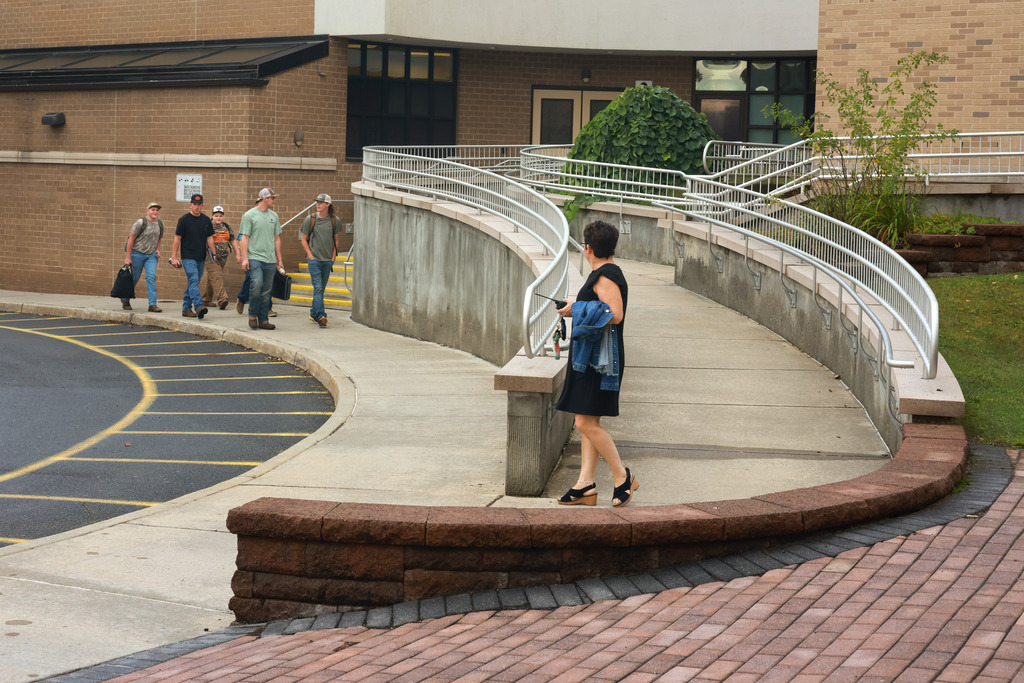 Students walk to front office of OV