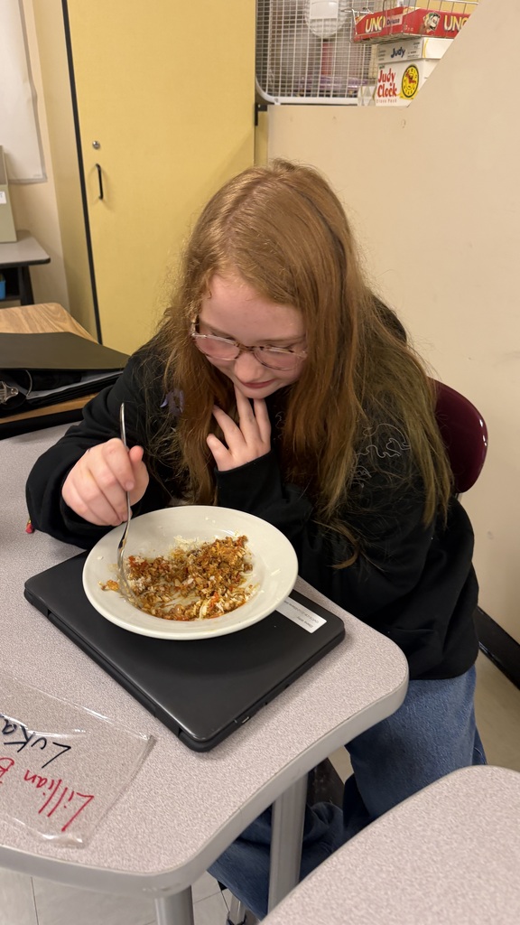 Student looking at pasta